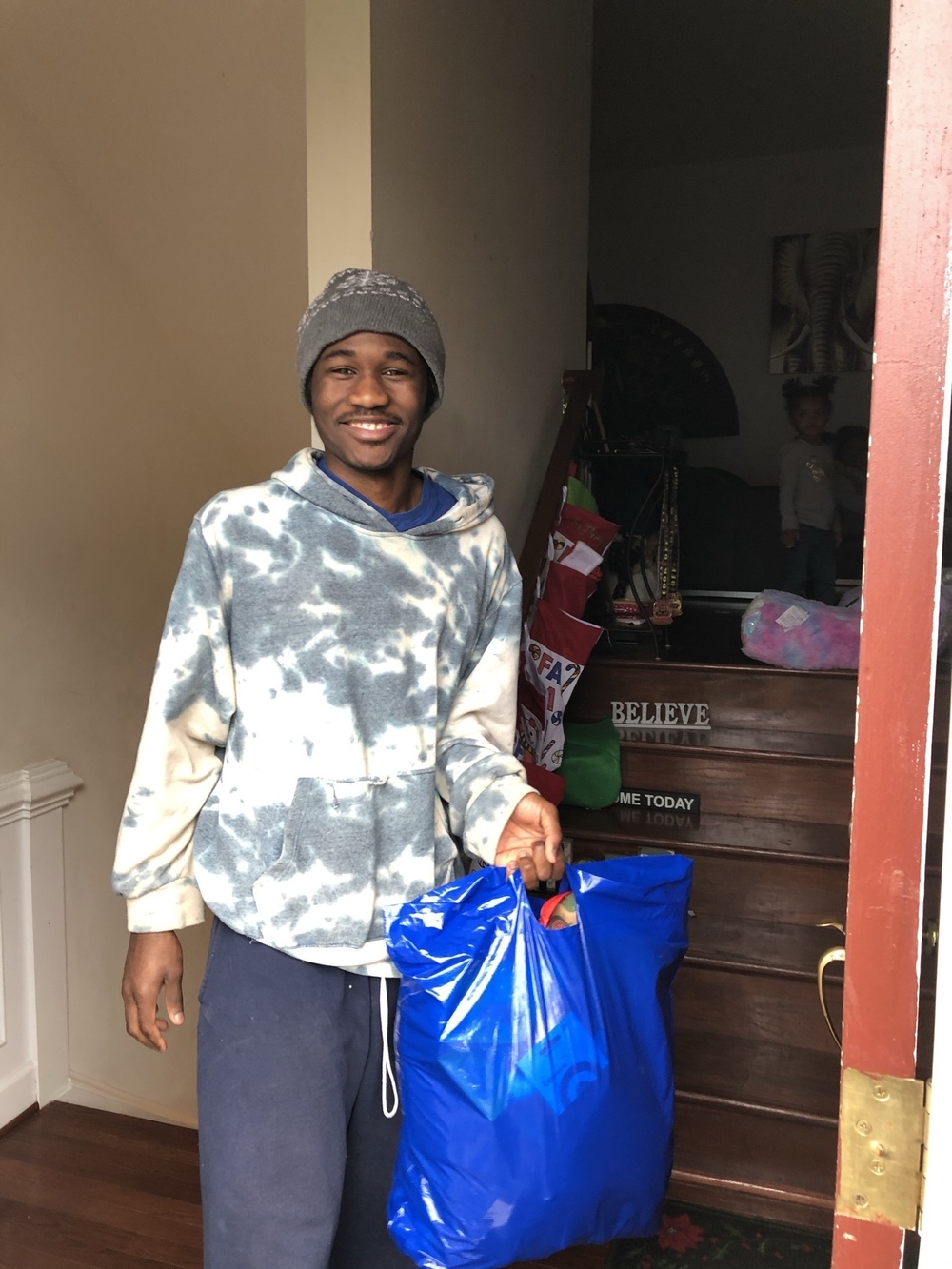 Soldiers within the DCS G6 and CIO delivering meals and gifts to local soldiers in need