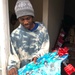Soldiers within the DCS G6 and CIO delivering meals and gifts to local soldiers in need