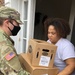 Soldiers within the DCS G6 and CIO delivering meals and gifts to local soldiers in need