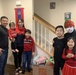 Soldiers within the DCS G6 and CIO delivering meals and gifts to local soldiers in need