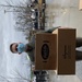 Soldiers within the DCS G6 and CIO delivering meals and gifts to local soldiers in need