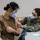 Lt. Cmdr. Kelly Peng, an emergency medicine physician assigned to U.S. Naval Hospital (USNH) Naples, receives the Moderna coronavirus (COVID-19) vaccine Lt. Cmdr. Kelly Peng, an emergency medicine physician assigned to U.S. Naval Hospital (USNH) Naples, receives the Moderna coronavirus (COVID-19) vaccine