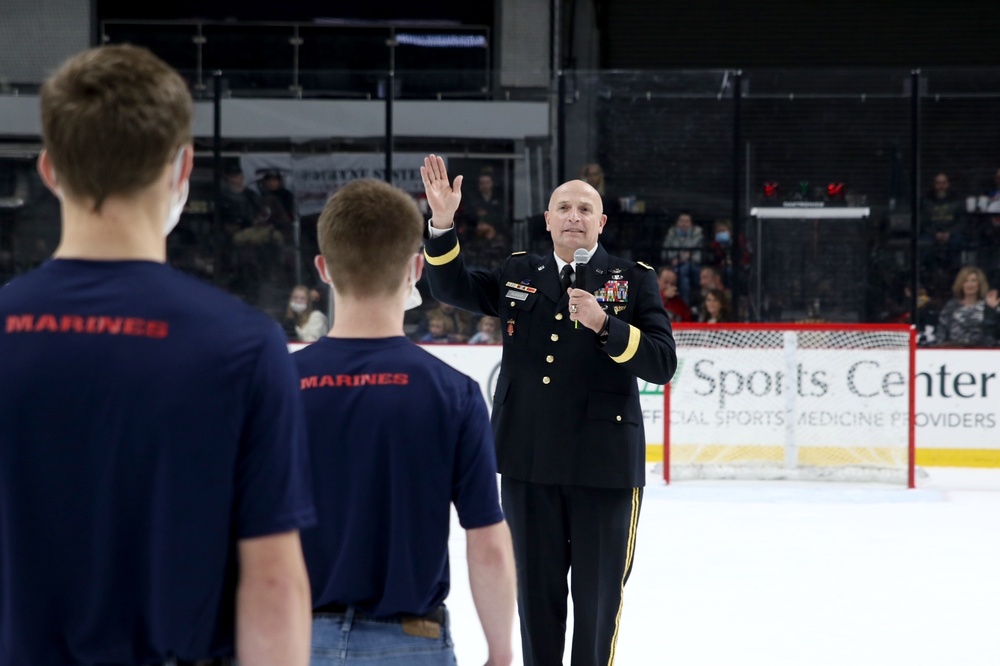 Army general enlists 12 Marine poolees during Havoc hockey game