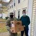 Soldiers within the DCS G6 and CIO delivering meals and gifts to local soldiers in need