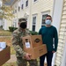 Soldiers within the DCS G6 and CIO delivering meals and gifts to local soldiers in need