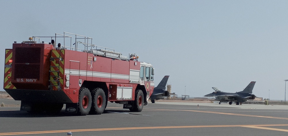 FIRE TRUCK ARRIVES IN SUPPORT OF AIRCRAFT EMERGENCY