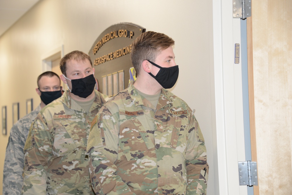 Iowa Air National Guard Airmen wait to receive COVID-19 vaccine