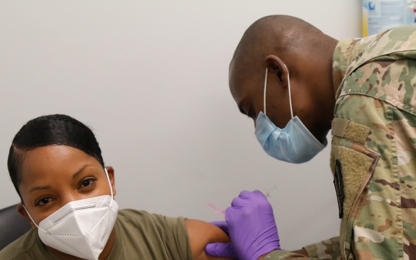 Commander Receiving COVID-19 Vaccine
