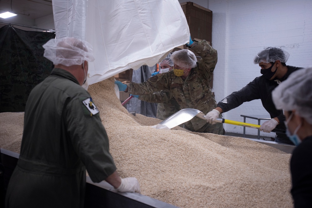 Guardsmen volunteer at local food bank