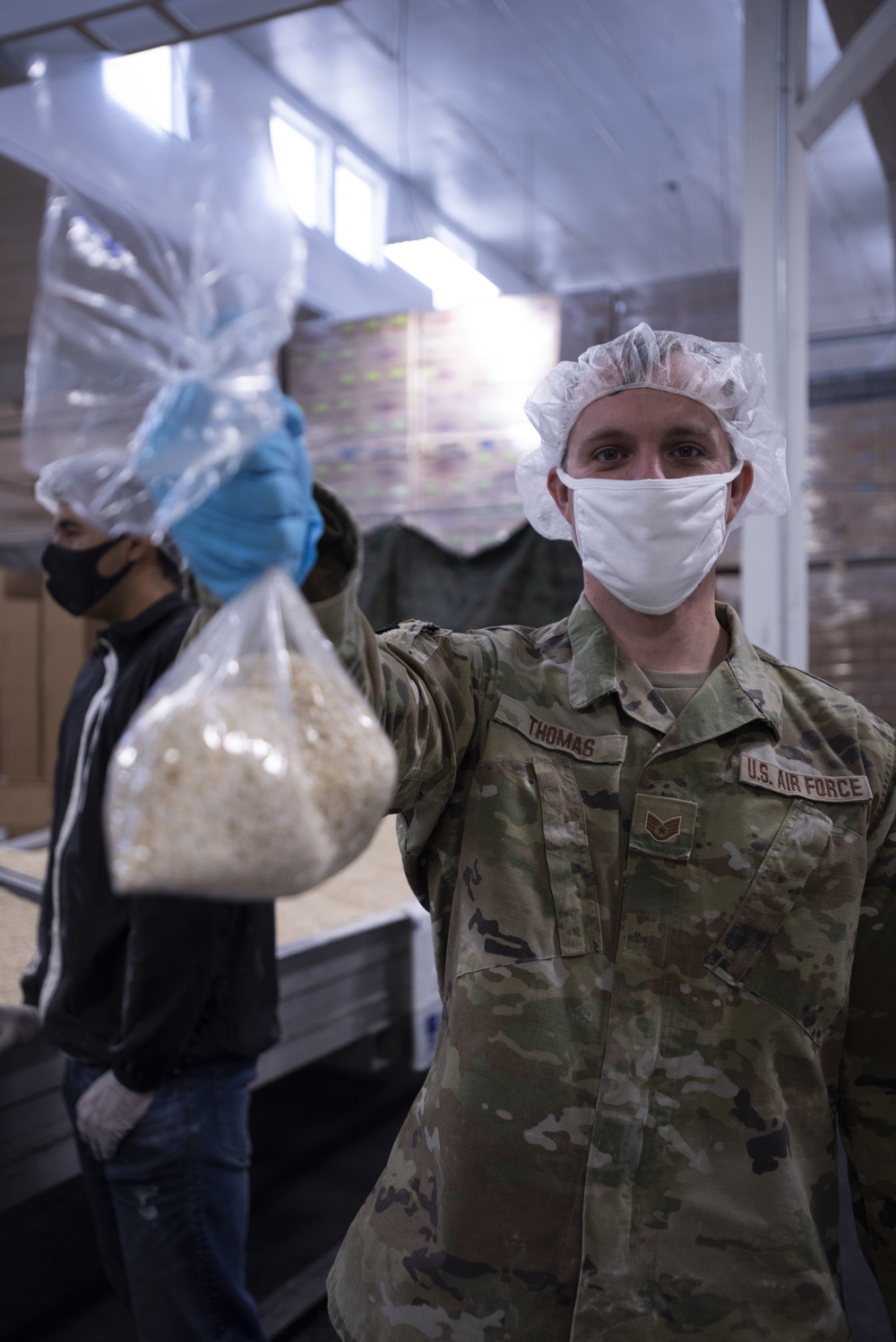 Guardsmen volunteer at local food bank