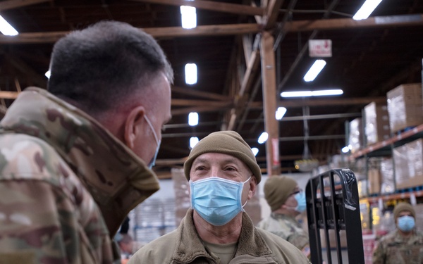 Guardsmen volunteer at local food bank