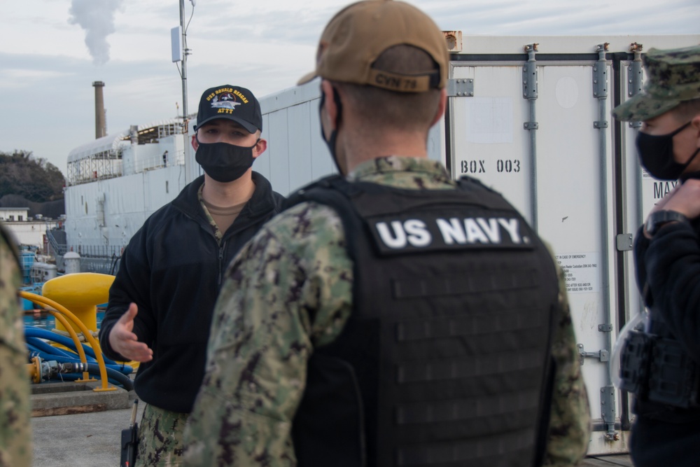 USS Ronald Reagan (CVN 76) Sailors conduct a security exercise.