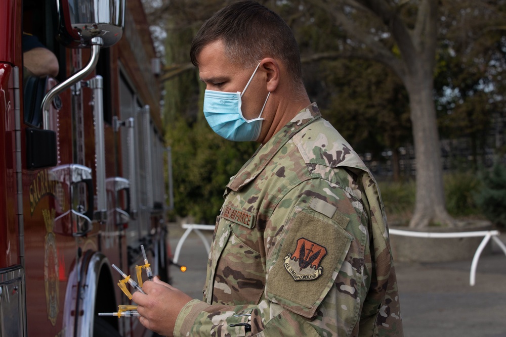 Cal Guard and Sacramento Public Health administer COVID-19 vaccine to first responders