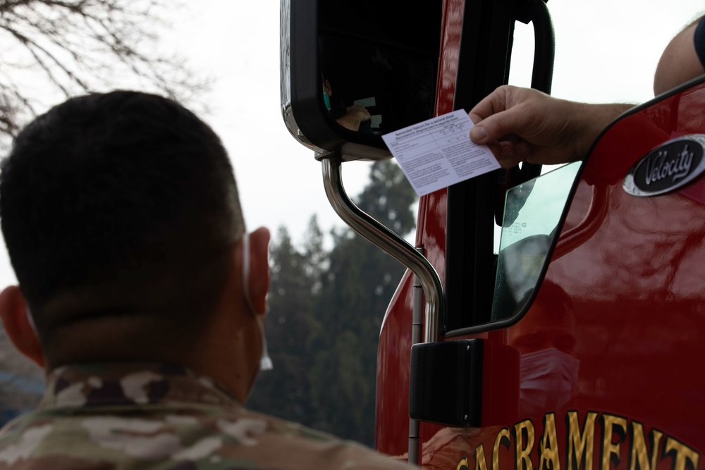 Cal Guard and Sacramento Public Health administer COVID-19 vaccine to first responders