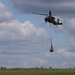 101st Airborne Division helicopter with supplies attached in net during JRTC rotation