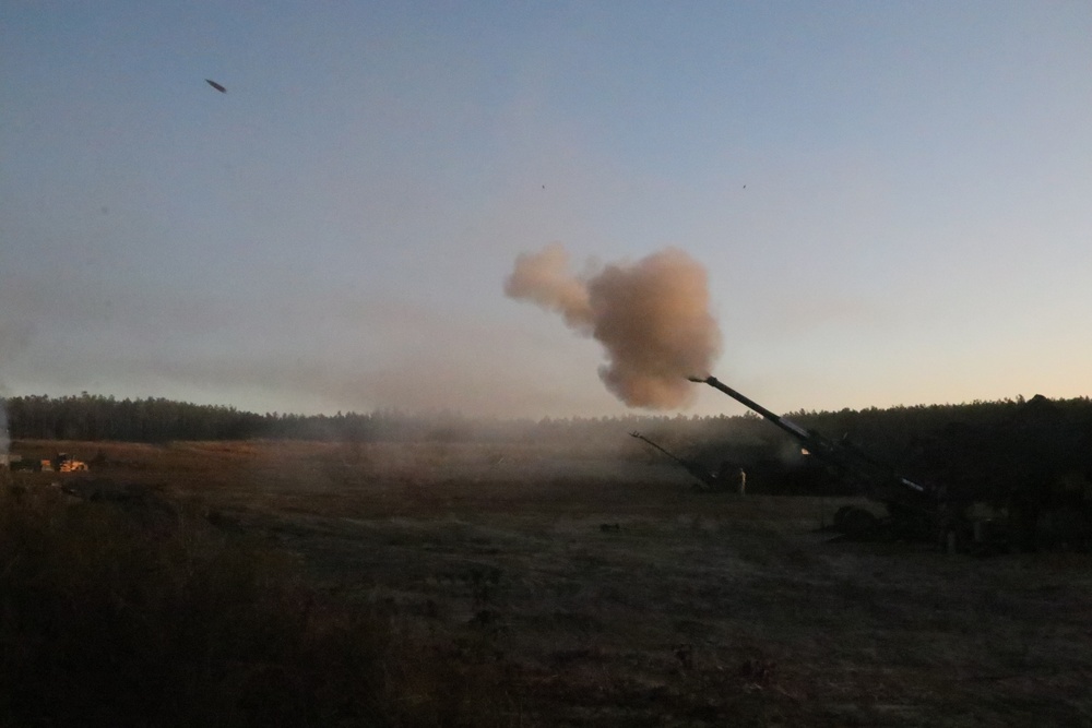 1-2 Stryker Brigade fires heavy artillery in to the evening sky at JRTC.