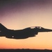 Historical photo of Air Force fighter jet in evening sky at JRTC.