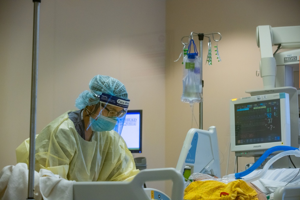 Air Force medical providers work alongside Arrowhead Regional Medical Center personnel