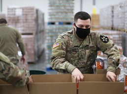 Washington National Guard supports Emergency Food Network pack emergency food boxes