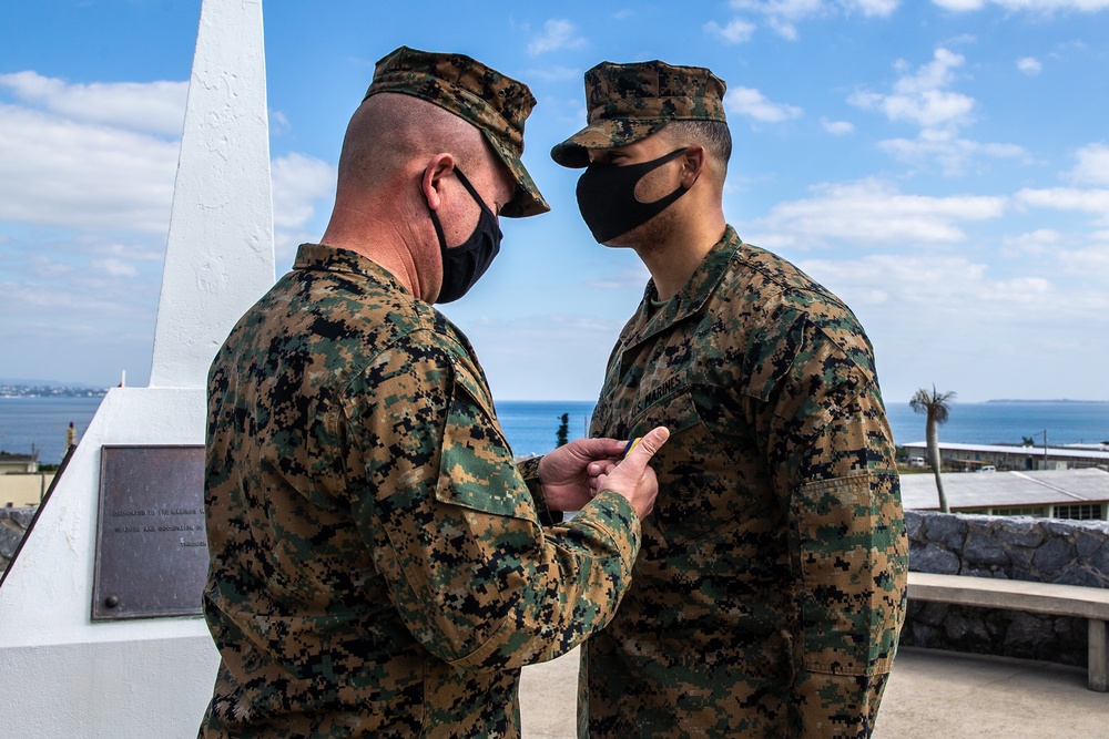U.S. Marine Corps Sgt. Brandon C. Antoine receives the Navy and Marine Corps Medal