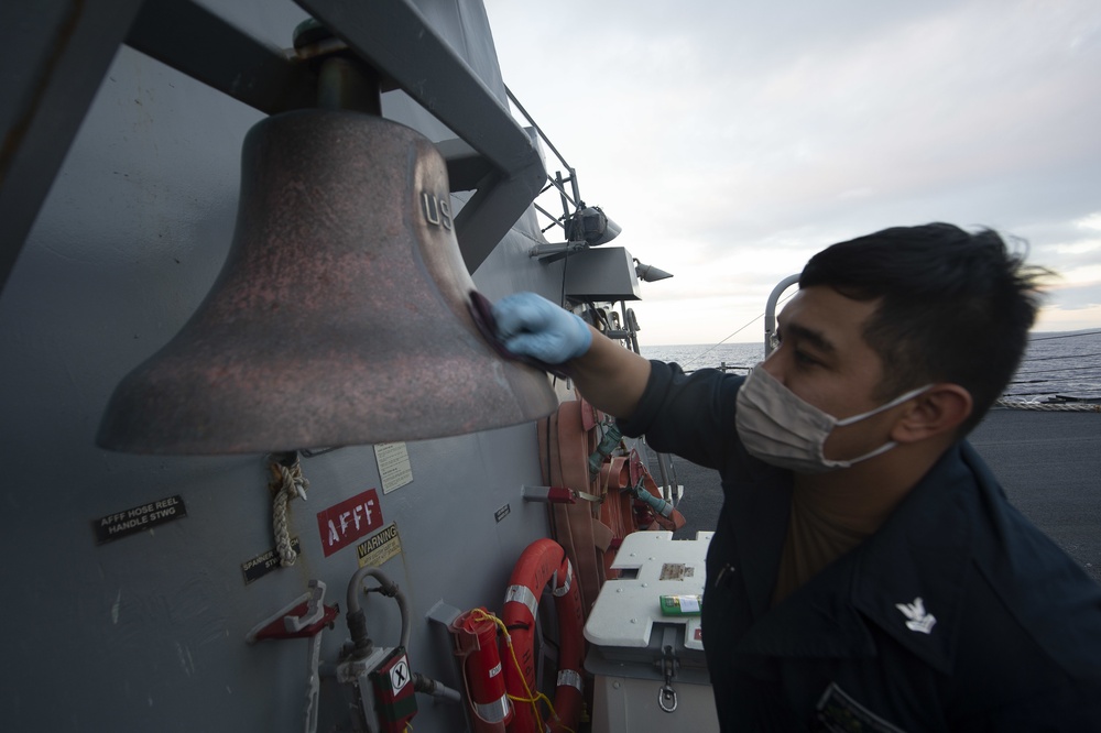 USS Ralph Johnson Sailor Removes Corrosion