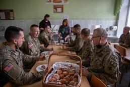 Task Force Illini advisors donate time, supplies to local school