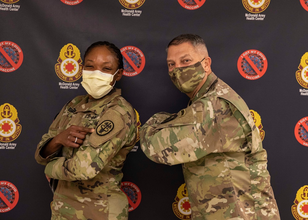 JTF-CS Commanding General, JBLE COVID-19 Vaccine Coordinator Pose for Photo