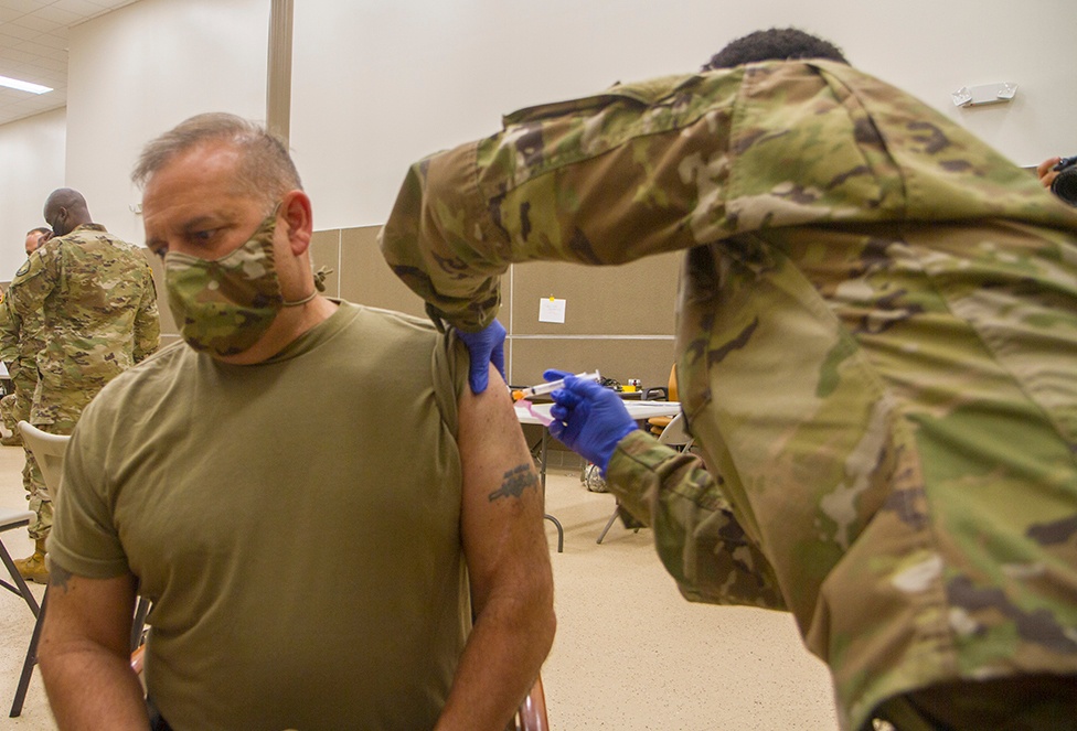 Deploying Florida Guardsmen receive COVID-19 vaccine