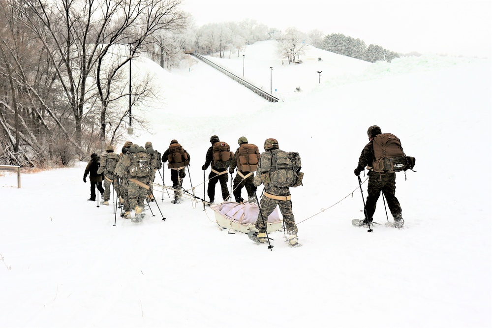 Fort McCoy CWOC class 21-02 students train using snowshoes, skis, ahkio sleds