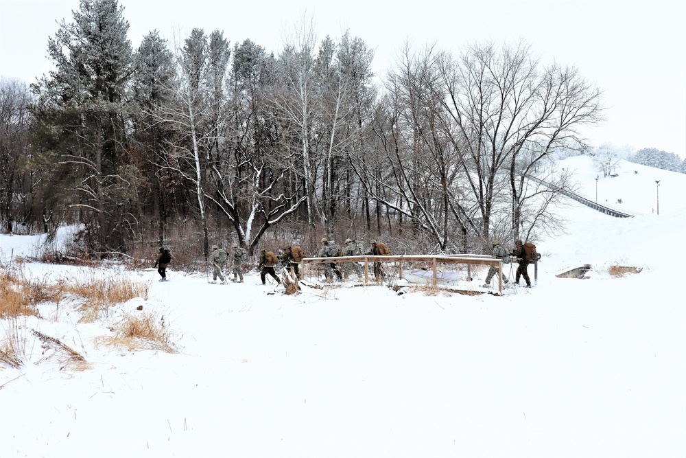 Fort McCoy CWOC class 21-02 students train using snowshoes, skis, ahkio sleds