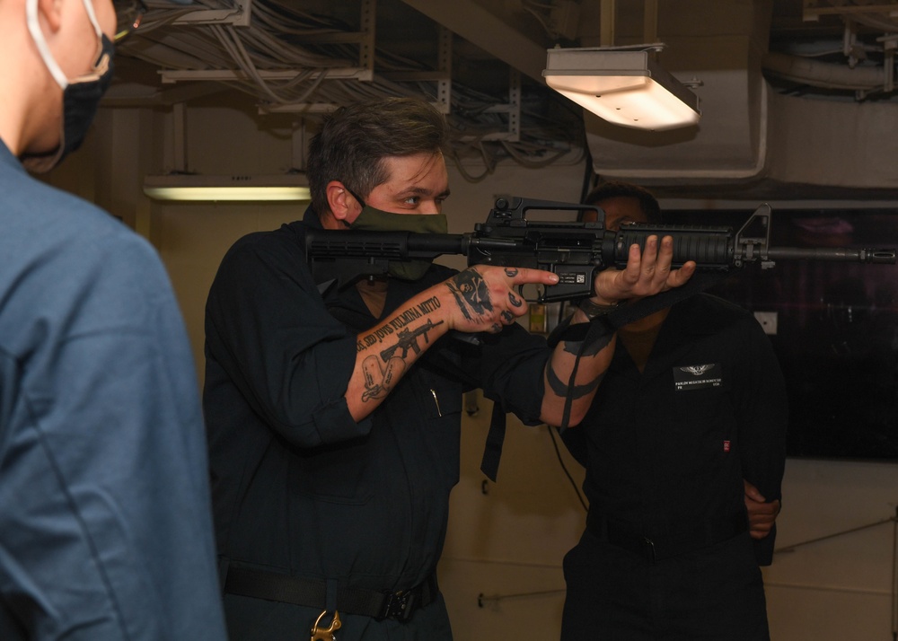 Sailors practice shooting techniques