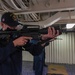 Sailor practices proper handling of an M4 service rifle