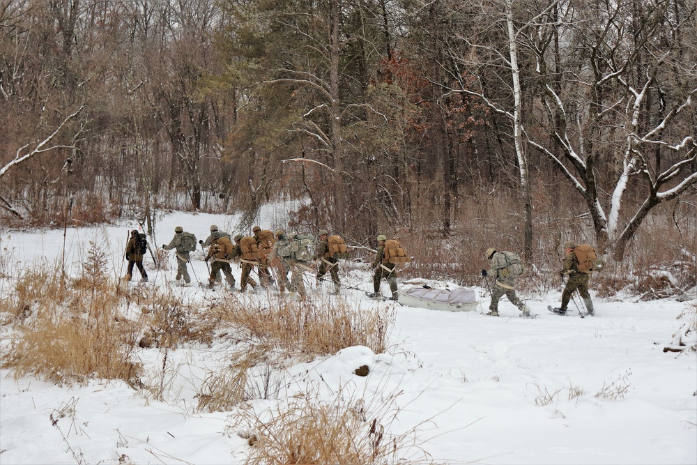 Fort McCoy CWOC class 21-02 students train using snowshoes, skis, ahkio sleds