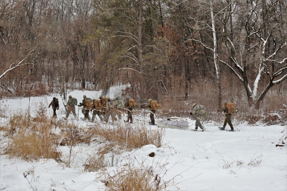 Fort McCoy CWOC class 21-01 students train using snowshoes, skis, ahkio sleds