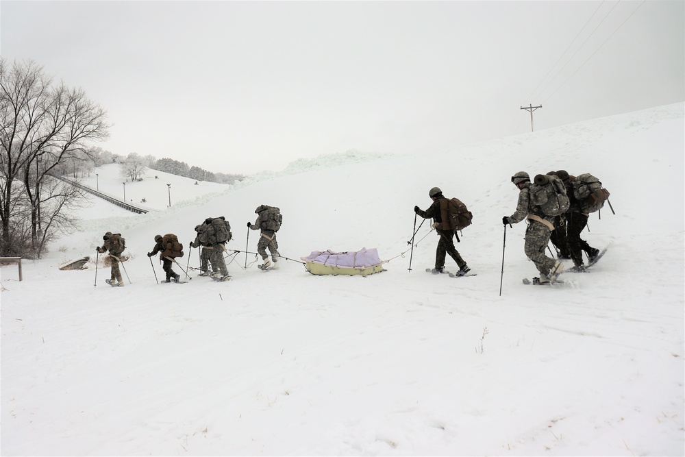 Fort McCoy CWOC class 21-02 students train using snowshoes, skis, ahkio sleds