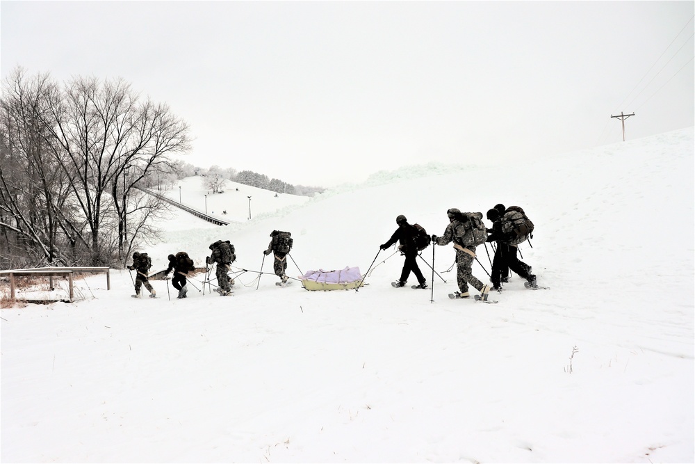 Fort McCoy CWOC class 21-02 students train using snowshoes, skis, ahkio sleds
