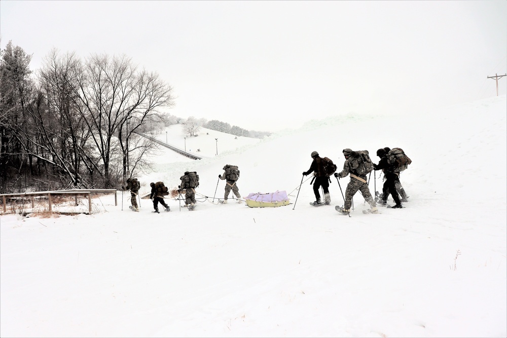 Fort McCoy CWOC class 21-02 students train using snowshoes, skis, ahkio sleds
