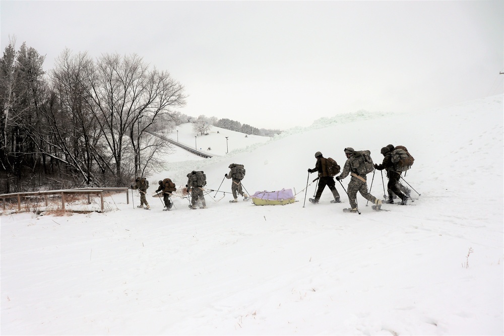 Fort McCoy CWOC class 21-02 students train using snowshoes, skis, ahkio sleds