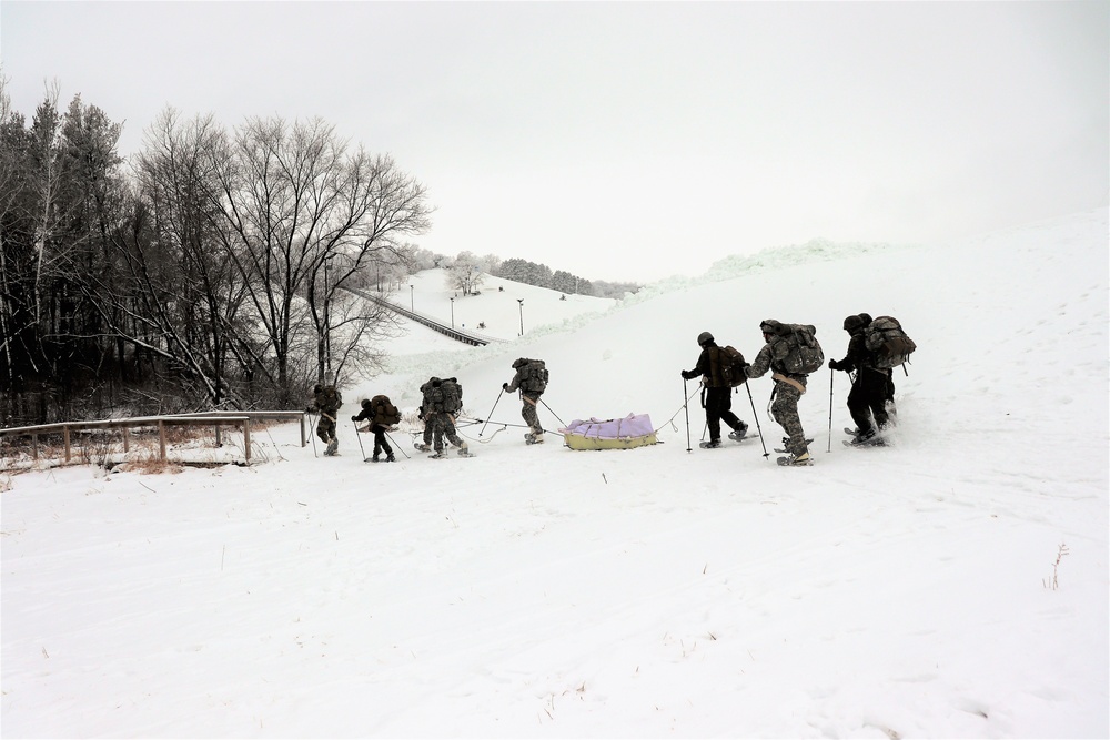 Fort McCoy CWOC class 21-02 students train using snowshoes, skis, ahkio sleds