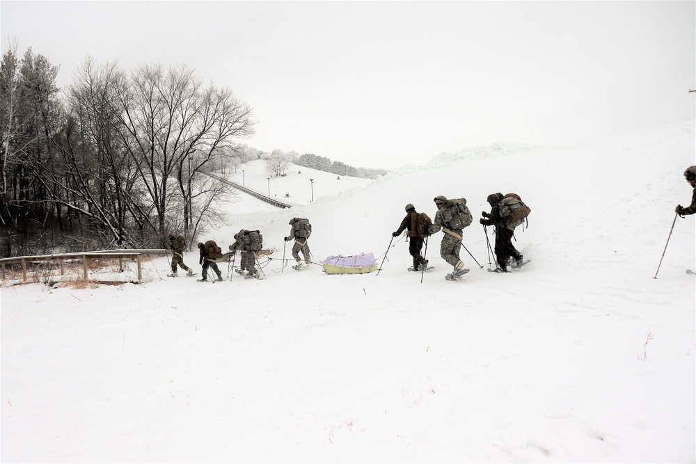 Fort McCoy CWOC class 21-01 students train using snowshoes, skis, ahkio sleds