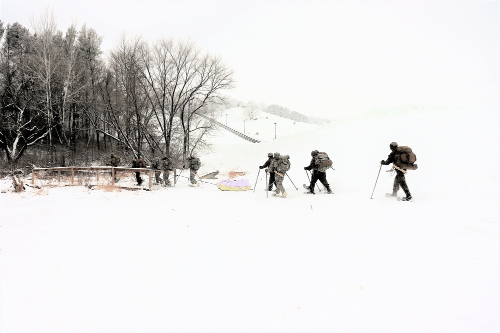 Fort McCoy CWOC class 21-02 students train using snowshoes, skis, ahkio sleds