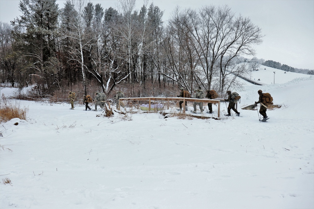 Fort McCoy CWOC class 21-02 students train using snowshoes, skis, ahkio sleds