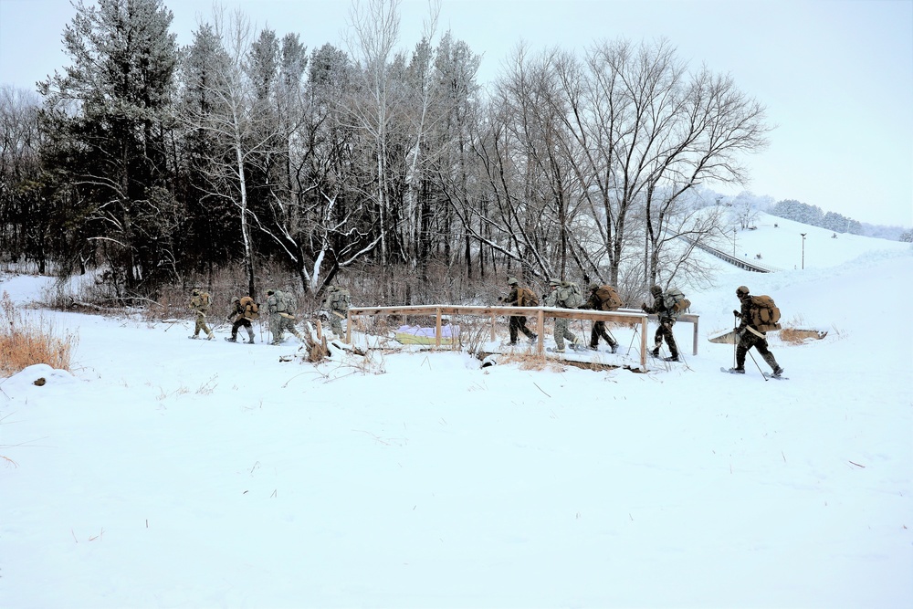 Fort McCoy CWOC class 21-01 students train using snowshoes, skis, ahkio sleds