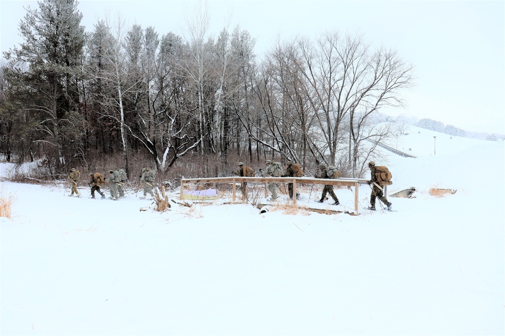 Fort McCoy CWOC class 21-02 students train using snowshoes, skis, ahkio sleds