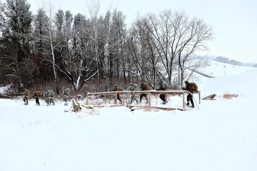 Fort McCoy CWOC class 21-02 students train using snowshoes, skis, ahkio sleds