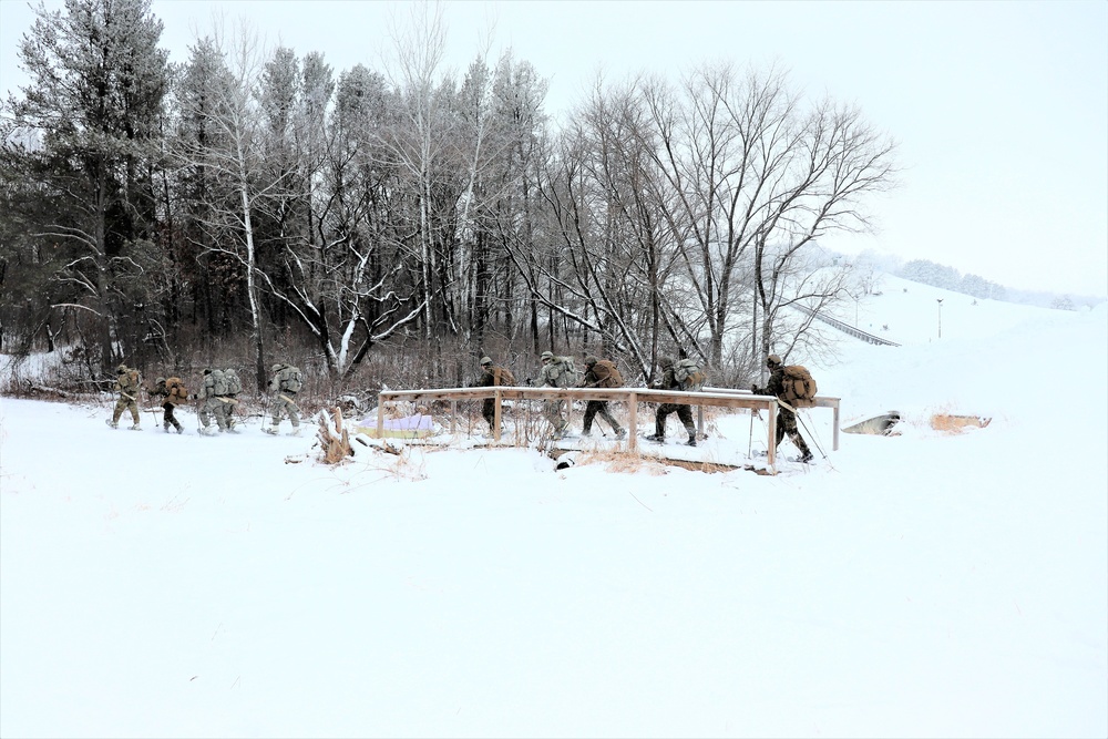 Fort McCoy CWOC class 21-02 students train using snowshoes, skis, ahkio sleds