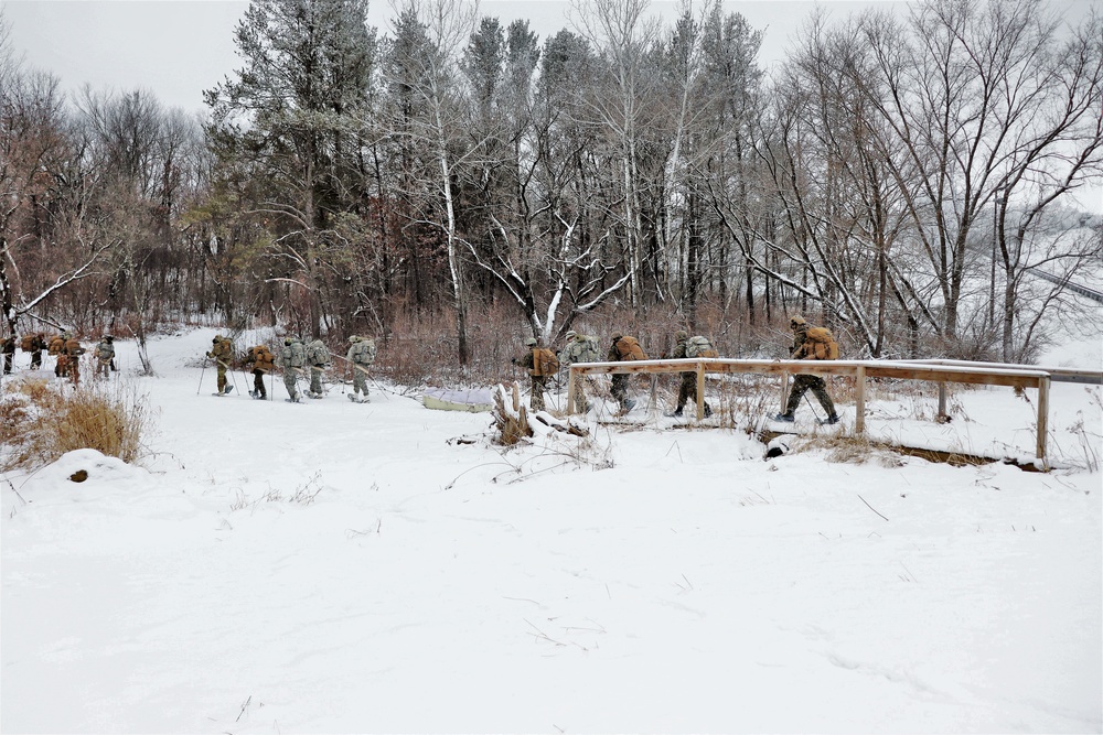 Fort McCoy CWOC class 21-02 students train using snowshoes, ahkio sleds