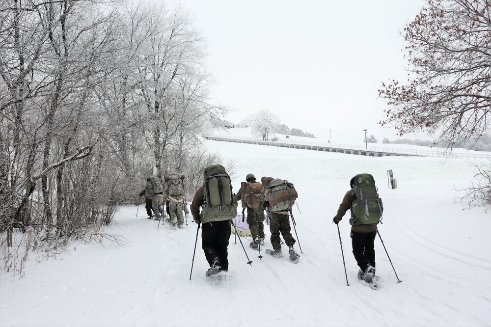Fort McCoy CWOC class 21-02 students train using snowshoes, ahkio sleds