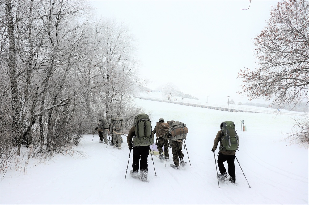 Fort McCoy CWOC class 21-02 students train using snowshoes, ahkio sleds