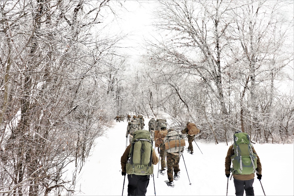 Fort McCoy CWOC class 21-02 students train using snowshoes, ahkio sleds